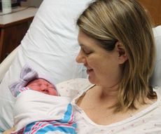 Keri Skipper holds her new-born daughter, Hayden, delivered at 7:33 a.m. New Year's Day. The baby was delivered at Greer Memorial Hospital.