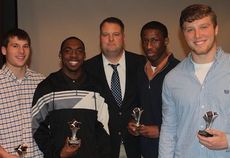 The 2012 permanent team captains are, left to right: John Hicks, D'Anta Fleming, Josh Gentry and Alex Waters. Head Coach Will Young, center, began the award several years ago to recognize leadership from senior football players.