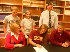 Jessica Gay signs a grant-in-aid to play basketball at NCAA Division II Erskine College. Her parents, Tracy and Steven, brother Austin, sister Mary-Claire, and Greer coach Carlton Greene share in the ceremony this morning at Greer High School.