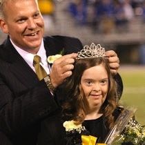 Bruce Mathis took over for Greer Principal Marion Waters for a short time during his illness last fall. He crowns Chelsea Jones the 2012 Homecoming Queen in this photo.
 