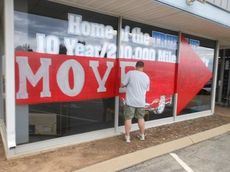 There was no doubt where customers were steered to go today as D&D Ford opened its new facility. Matthew Forest painted the big red signage on the former business site on Saturday.