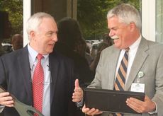 Bill Roughton, left, President of the Executive Board for the Greater Greer Chamber of Commerce, and John Mansure, President of GHS Greer Memorial, enjoy a laugh at the ribbon cutting at the GHS Greer Medical Campus today. 