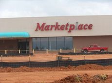 The Walmart Neighborhood Market is beginning to show signs of growth with the Greer Plaza facade and parking lot getting a complete makeover. A $2.4 million upfit for the former Winn-Dixie store will begin after the facade and parking lot are completed.