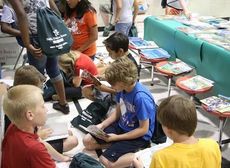 Crestview students are already absorbed in free books they selected as part of a $15,000 grant to provide each student with 12 free books.