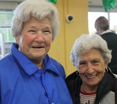 Betty Witthuhn, left, and Mary Leonard arrived at 7 a.m. to be first in line when the Walmart Neighborhood Market opened an hour later.