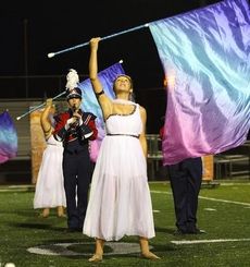 Color guard co-captain Ashley Sirovatka performs during Riverside's performance at Irmo.
 