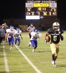 Greer's Emanuel Kelly is on his way to scoring on a 65-yard touchdown after a pass reception from Mario Cusano.