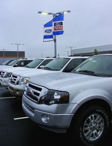 A line of Ford Expeditions are parked together at the new location. The inventory includes more than 200 new vehicles and about 50 used.
