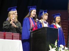 Riverside High School begins its commencement exercises with class leaders addressing their peers. A sign language interpreter was provided.
 
 