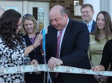 Jack Lucas, GrandSouth Bank Greer Market President, shared the ribbon cutting duties with his daughter, Heidi.
 