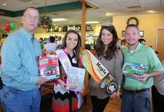 Kevin and David Holtzclaw organized the 10th annual Syl Syl Toy Drive in memory of their mother, Sylvia Holtzclaw. Taylor Ross (Miss Greater Greer Teen) and Lanie Hudson (Miss Greater Greer) gave their support.