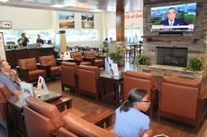 The visitor's lounge at Toyota of Greer was renovated to include a new customer service lounge with a lodge-like setting.
 