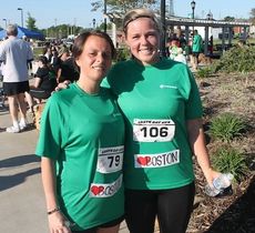 Jennifer Owen, left, and Meredith Oates added a heart and the word Boston to their bib.