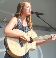 Megan Watts delighted the spectators to a song she wrote and sang, 