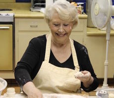 Nancy Welch made thousands of her signature Angel Biscuits for Big Thursday. 
 