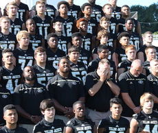 It seems everybody was ready for the team picture except Greer Head Coach Will Young, who is sporting a full beard this season. Actually, Young, coaching his 10th season at Greer, was wiping perspiration from his face just before the photo was taken.
 