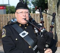 The bagpipe was a solemn reminder for the purpose of honoring of the firefighters' fallen comrades.
 