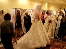 Brides-to-be were trying on dresses at the Brides against Breast Cancer event.