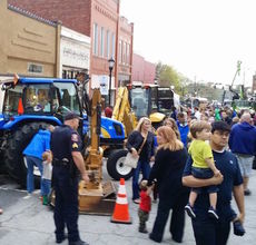 Trade Street was busy early during Touch a Truck with children and adults checking out the vehicles.
 