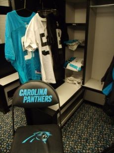 Jerseys like the ones displayed in the cubicle are among $50,000 of uniforms, game and practice, donated to 16 high schools in the Carolinas.