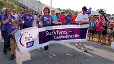 The survivor's walk at Dooley Field Friday night where Greer Relay for Life was held.