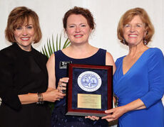 Amy Carter, center, was announced as South Carolina Teacher of the Year 2022 by State Superintendent of Education Molly Spearman (right).
 