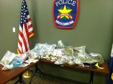27.5 pounds of marijuana was found at the suspect's address at 405 Harvey Road.