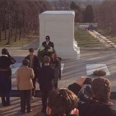 Sarah Weaver and Geoffrey Barnett face Blue Poteat and Cameron Hepola, bottom, at the Tomb of the Unknowns as their classmates observe the placing of the wreath ceremony.
 
 
Blue Poteat and Cameron Hepola 