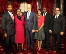 Senator Tim Scott with his family, his pastor, and Vice President Biden after being sworn in.
 