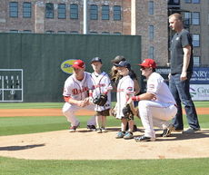 Michael and Dillon Jacobs threw out the ceremonial first pitch at Fluor Field Sunday afternoon. They received a sustained standing ovation.
 