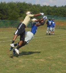 This pass was dropped during the passing scrimmage today at Greer High School's practice fields.