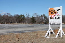Some site preparation will be needed for the 1.9-acre site that formerly housed the D & D Motors used car lot.
 
