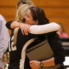 Greer High volleyball coach Traci Farrington gets a hug from a senior.
 
 
