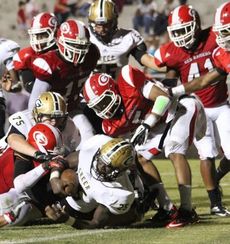 Brook Chapman gets to the one-yard line during a Greer drive late in the fourth quarter tonight at Sirrine Stadium. The officials penalized Greer for giving Chapman an extra push to the goal line.