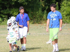 Former players are paying it forward by teaching younger players in the basic skills of the sport.
