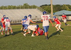 Ross Jeffeaux is in a race for the end zone on the final play of Riverside's spring scrimmage.
 
 