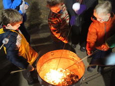 Roasting marshmallows provided some extra warmth on a cool night at City Park.
 