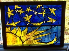 'The Great Lights' is the title of this stained glass.