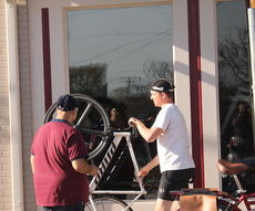 Bicyclists met outside the Benchmark Friday.
 
