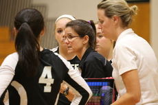 Coach Traci Farrington giving a view pointers during a time out.