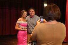 Parents enjoyed photographing pageant contestants.
 
 