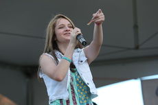 Taylor Lee, who competed last year in Teen Idol, performed her original song Friday, 