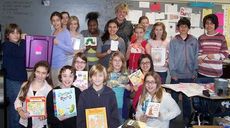 Members of Allison Burns’ 6th-grade class have researched cleft palates and Treacher-Collins syndrome and have collected more than 400 books and puzzles for Shriner’s Hospital, 
