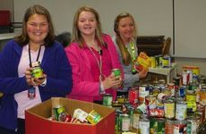 A fall canned food drive for Greer Community Ministries at Blue Ridge Middle School netted more than $3,300 in cash and a trunk load of nonperishable food. Left to right: Kaycee Gibson, Bailey Armstrong, and Marta Wood.
 
 