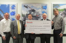 Left to right: Christoph Kleu, commercial plant manager for Bosch Rexroth, Les Gardner of the Greenville Tech Foundation, Mike McCormick, technical plant manager for Bosch Rexroth, Dr. Keith Miller, president of Greenville Technical College, and Claude Bray, director of human resources for Bosch Rexroth, as the company presents a check for $62,500 to the Greenville Tech Foundation to fund a hydraulics simulation lab at the college’s Center for Manufacturing Innovation.
 