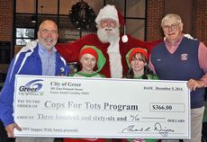 City of Greer employees contributed $366 to the Cops for Tots program Dec. 5 through ticket sales to Supper with Santa.
 