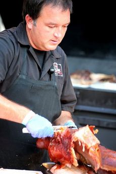Chef Samuel Jones barbecued pig was mouth-watering sensational. He was poetry in motion slicing the meat for the hundreds of visitors.