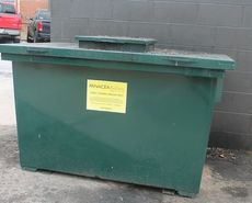 A collection container for used cooking grease sits near the dumpsters behind BIN112. It is used to make biofuels. Other captured FOG are forwarded to landfills in enclosed containers.