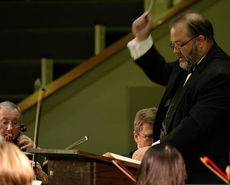 Kory Vrieze conducts the Foothills Philharmonic Orchestra.
 