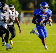 Riverside's Robert Morrow is off and running on a big play against Southside High School at Saturday's scrimmage.
 